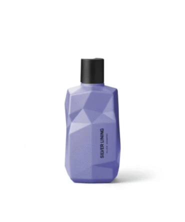 Nine Yards Silver Lining šampūnas violetiniame geometrinio dizaino buteliuke baltame fone