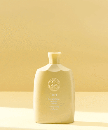 Oribe Hair Alchemy Resilience šampūnas – stiprinantis plaukų šampūnas nuo lūžinėjimo, geltonos spalvos pakuotė